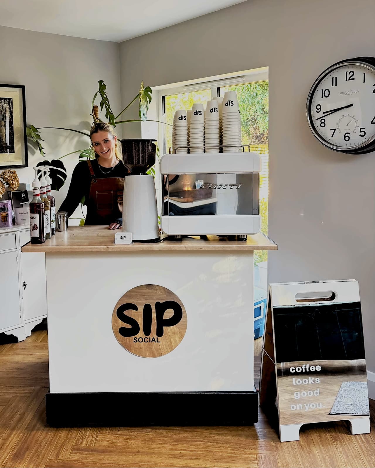 Branded Sip Social coffee cart at a product launch